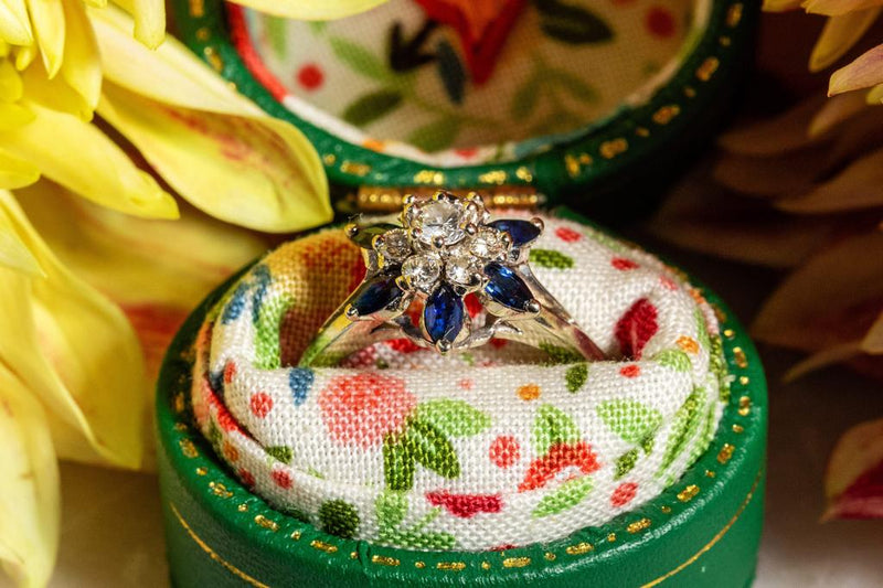 Diamond and Sapphire flower ring in white gold