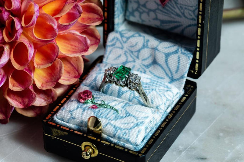 Emerald and Diamond trilogy ring set in white gold